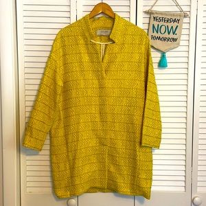 Zara. yellow coat with pockets.